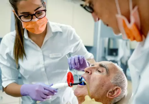 An elderly man receiving dental treatment thanks to Sedation Dentistry in Canton IL