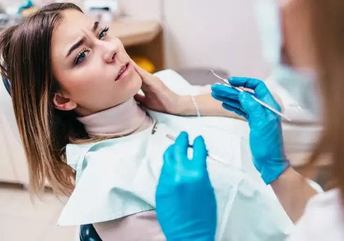 A concerned woman receiving Sedation Dentistry near Peoria County IL