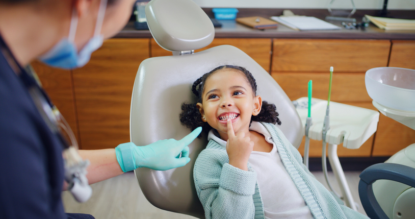 A happy child from Morton IL smiles while at Total Dental Care